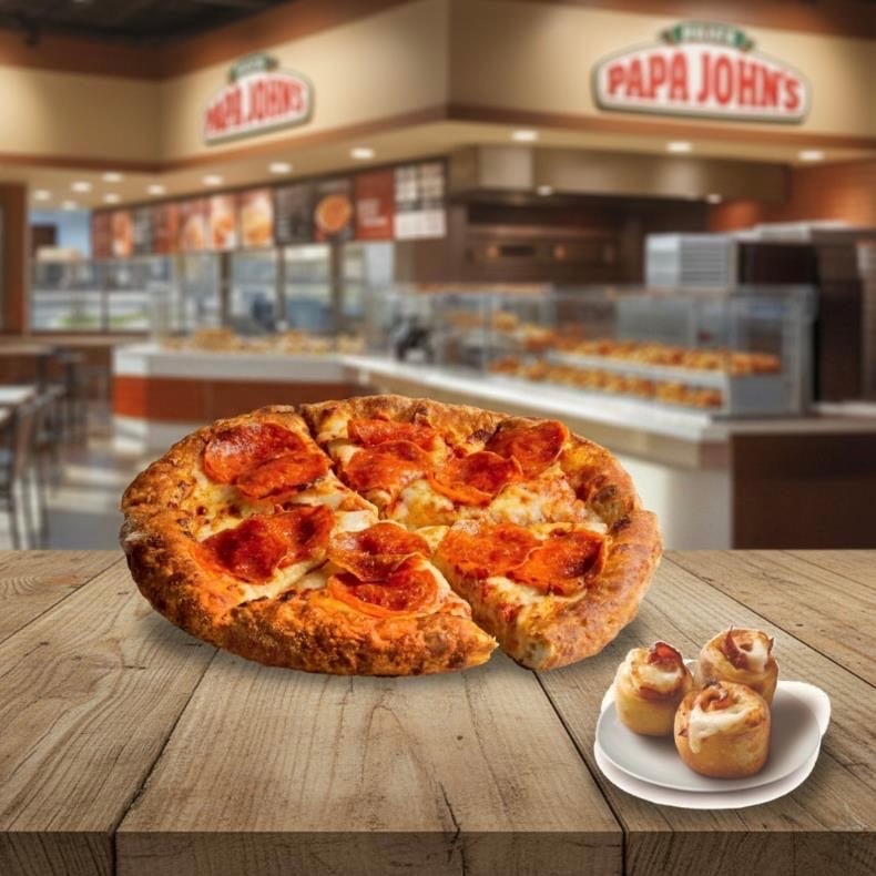 1 pizza mediana (clásica o especialidad) + 3 rolls de pepperoni o 3 nuditos de ajo a S/9.90